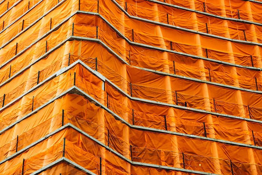 architectural photography of building, orange covered building photography HD wallpaper