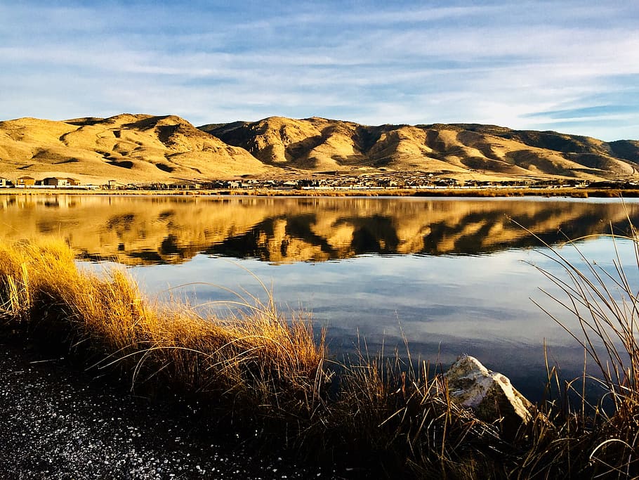 Body of Water Near Brown Mountains, clouds, daylight, grass, houses HD wallpaper