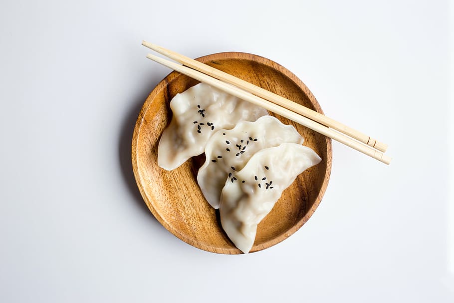 three dumplings on brown wooden plate, food, dish, breakfast, HD wallpaper
