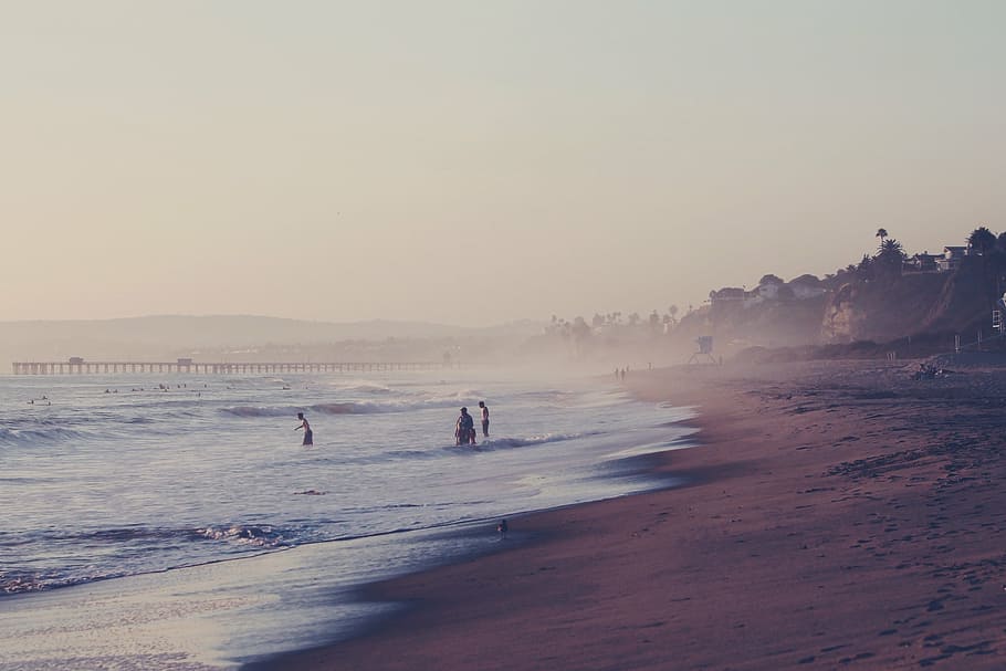 person swimming on beach, sandy beach, sunset, evening, pier, HD wallpaper