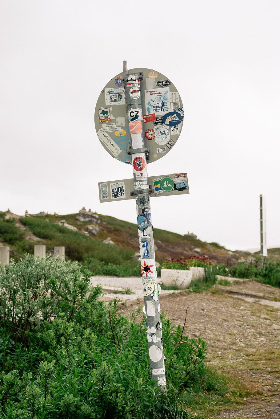 Road sign with stickers, objects, direction, guidance, outdoors, HD wallpaper