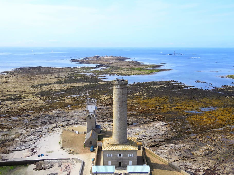 lighthouse, ocean, side, landscape, height, blue sky, rocks HD wallpaper