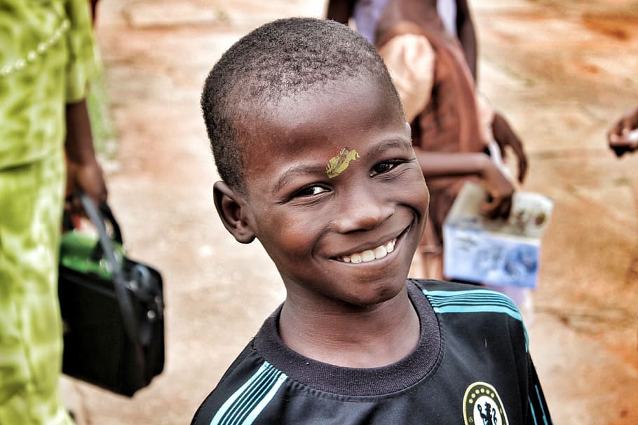 boy smiling with a leaf on his forehead, nigeria, child, happy, HD wallpaper