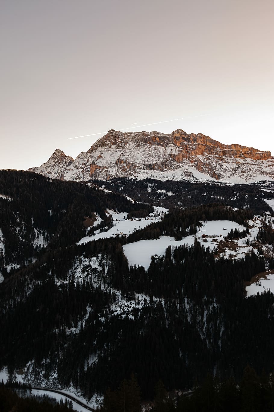 aerial photography of forest, snow-capped mountain under sky HD wallpaper