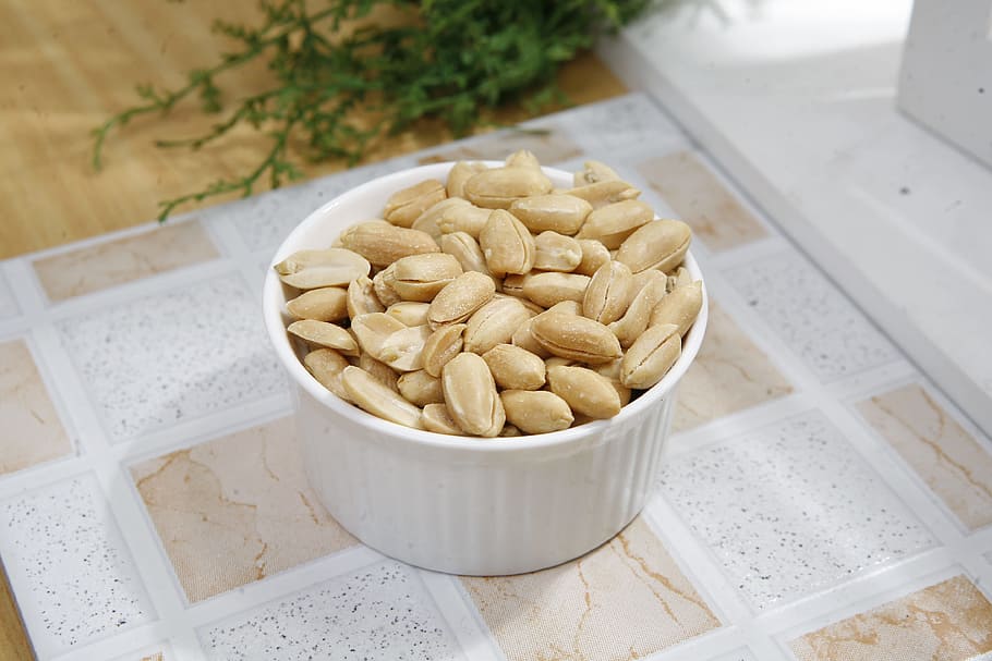 close up photograph of white ramekin with nuts, seasoned peanuts HD wallpaper