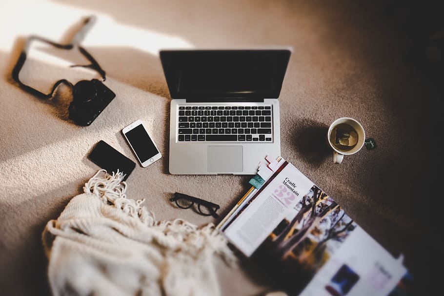 MacBook Pro on surface, laptop, apple, keyboard, technology HD wallpaper