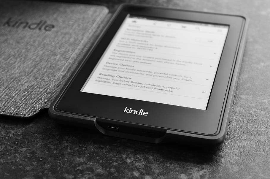 photo of black Amazon Kindle with gray case, kindle update, kindle download