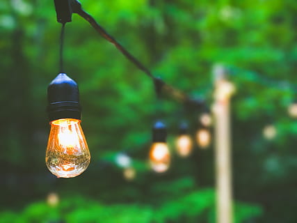 yellow string lights, shallow focus photography of pendant light HD wallpaper