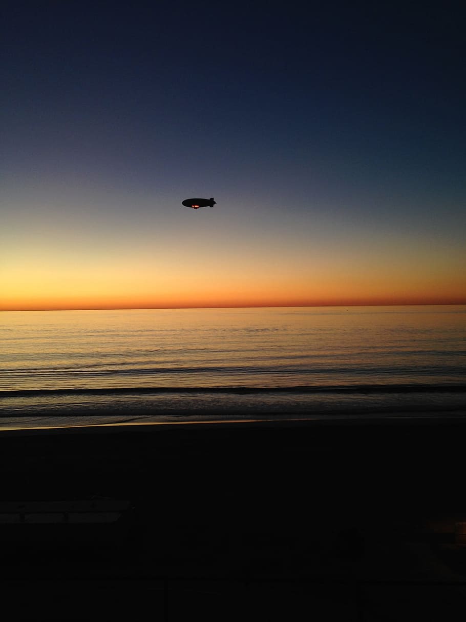 Blimp, Beach, Sunset, Peaceful, flying, sky, mid-air, silhouette HD wallpaper