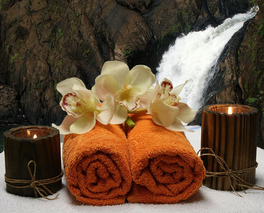 three white flowers on two brown textiles, wellness, relaxation HD wallpaper