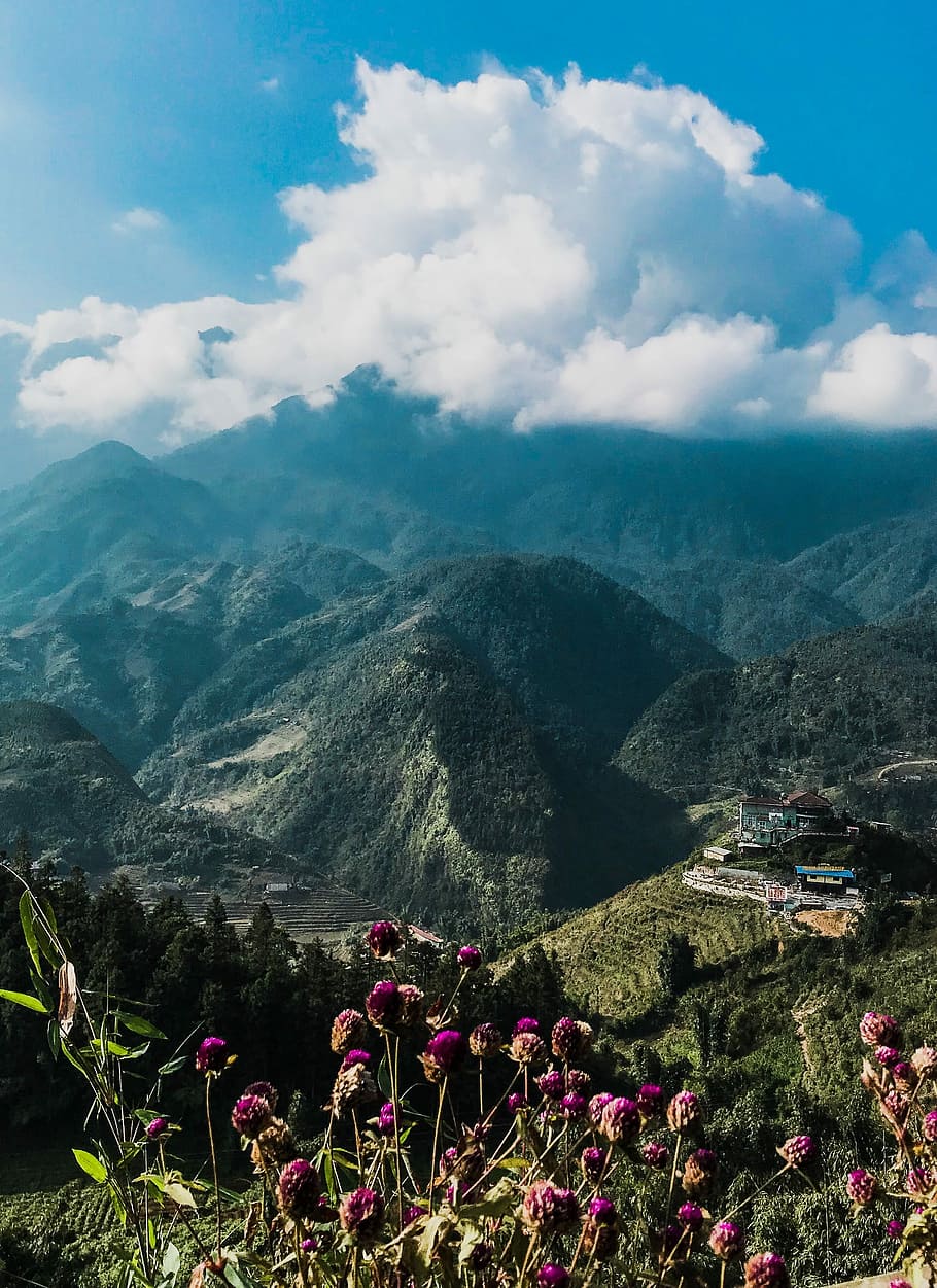 Views, aerial view photography of village near mountain range under cumulus clouds HD wallpaper