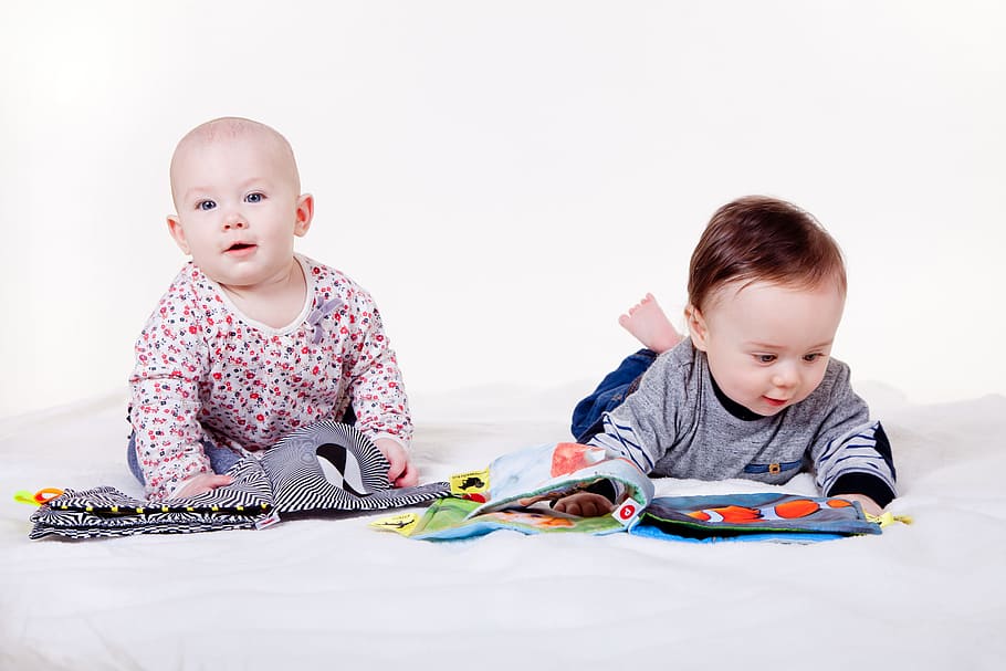 two baby crouching on white surface, child, children, fun, little thing