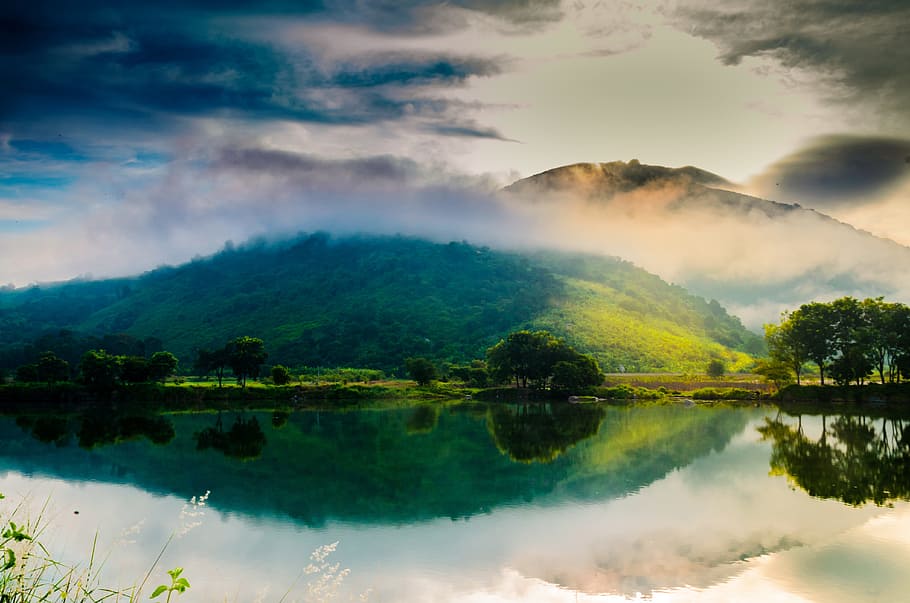 photo of mountains reflecting at body of water, natural, setting HD wallpaper