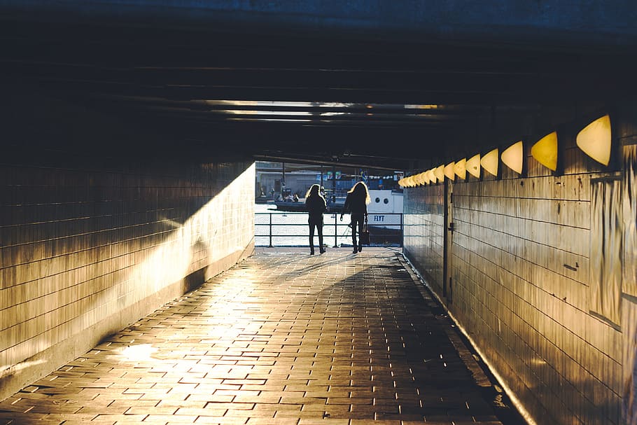 people, walking, back, silhouette, light, tunnel, dark, architecture HD wallpaper