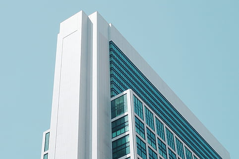 white and blue concrete high rise building during daytime, worm's-eye view photography of white building HD wallpaper