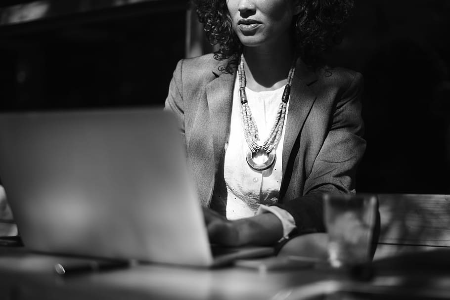 woman holding laptop sitting on chair, computer, wireless technology HD wallpaper
