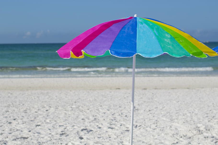 rainbow-colored umbrella on seashore, beach, vacation, sunshine, HD wallpaper