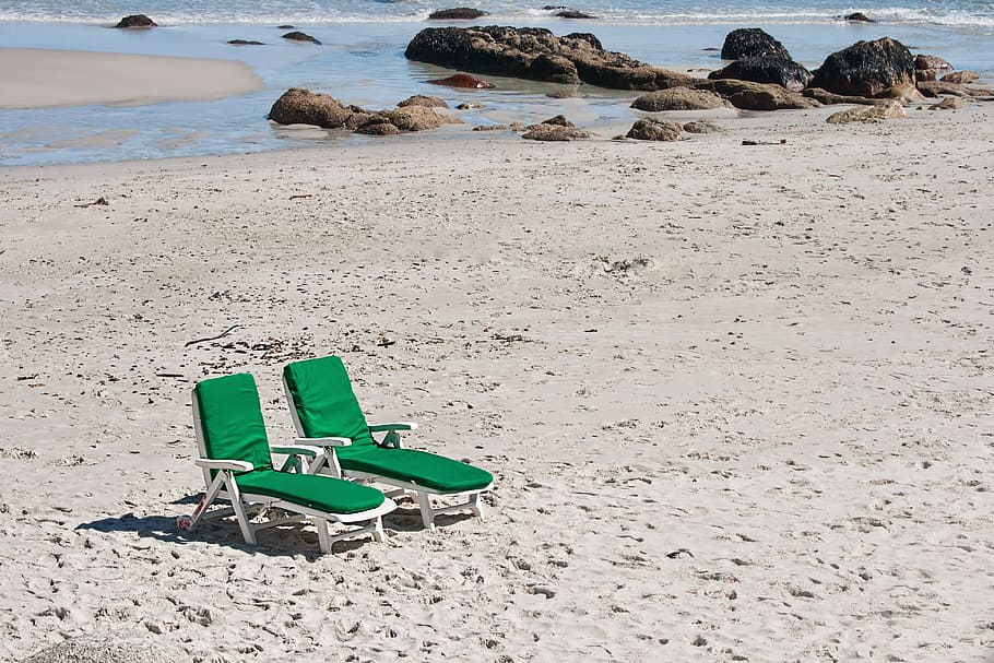 two green chaise lounges, beach, seaside, chairs, ocean, sand