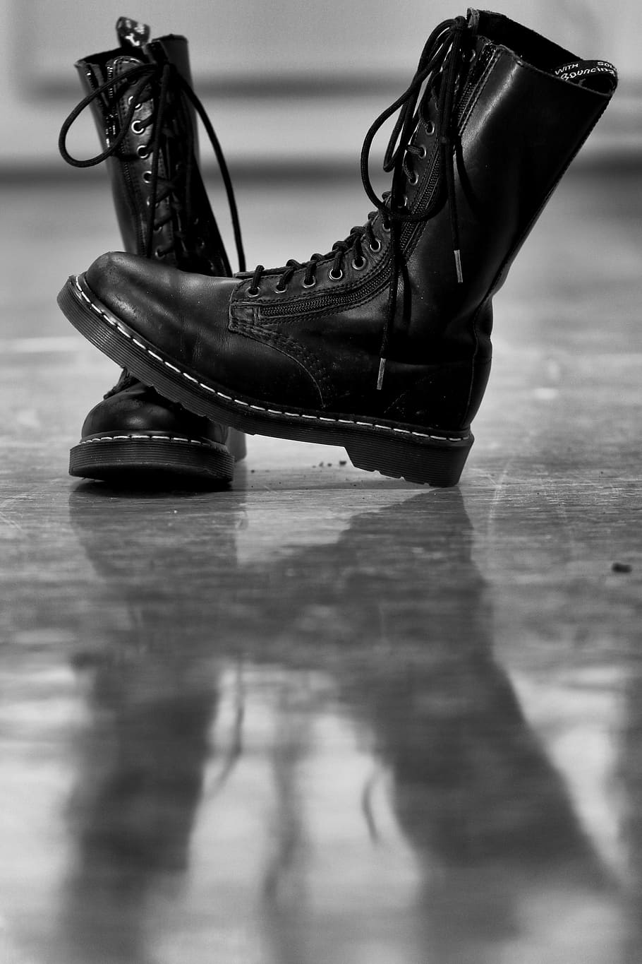 pair of black Doc Martens combat boots on gray surface, shoes, HD wallpaper