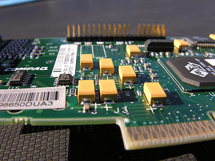 green and yellow expansion card on black surface, circuit board HD wallpaper