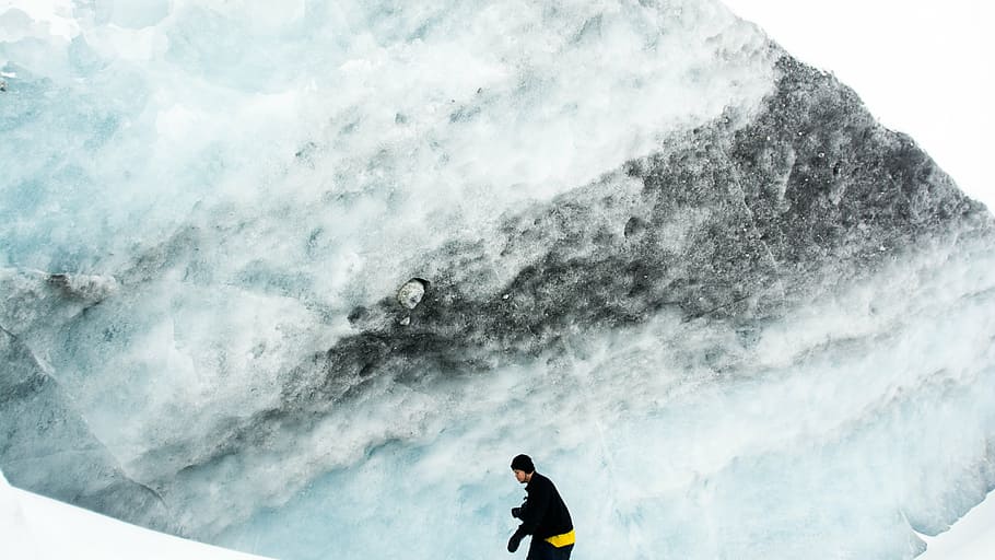 person standing on snowy mountain during daytime, glacier, ice HD wallpaper