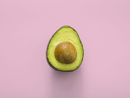 sliced green avocado fruit, avocado slice, seed, center, food HD wallpaper