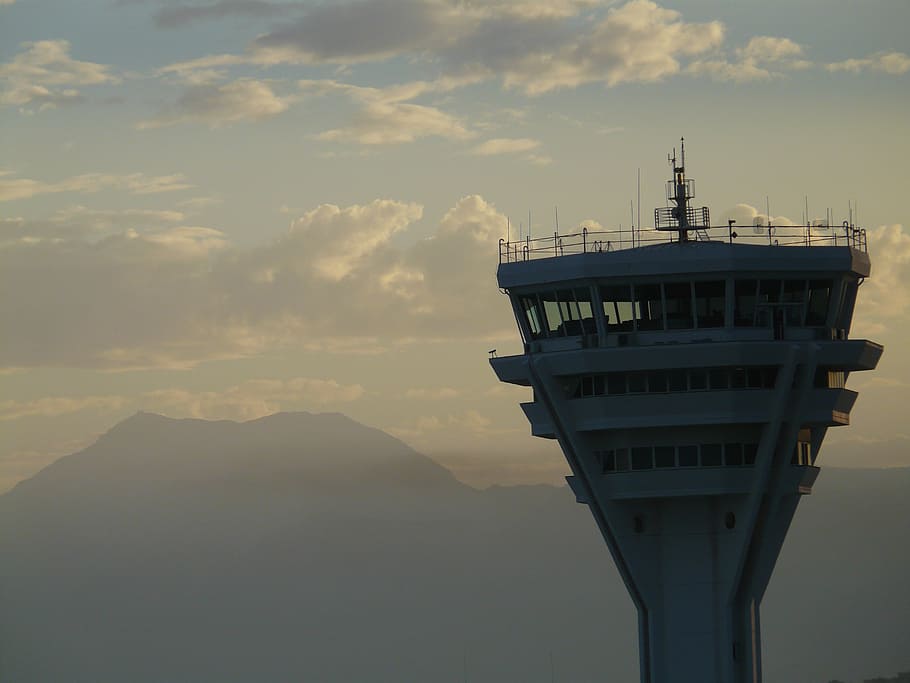 white airport tower during daytime, control tower, aviation safety
