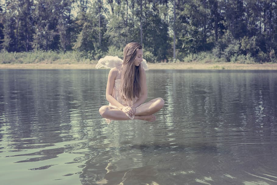 Pretty indian girl levitating, woman floating on water, levitation HD wallpaper