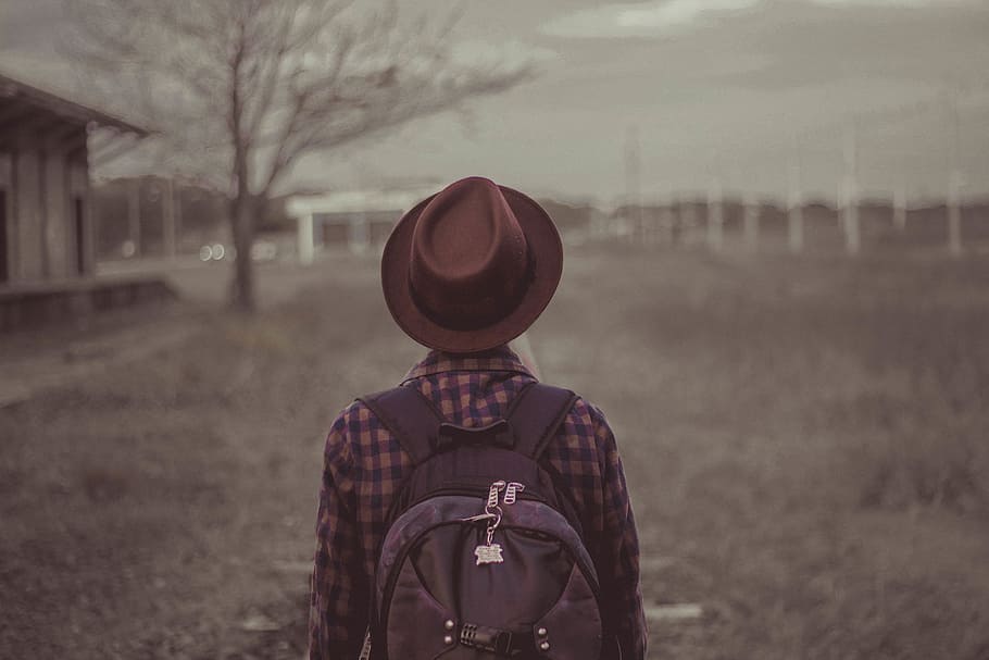 people, man, travel, hat, walking, field, house, tree, one person HD wallpaper