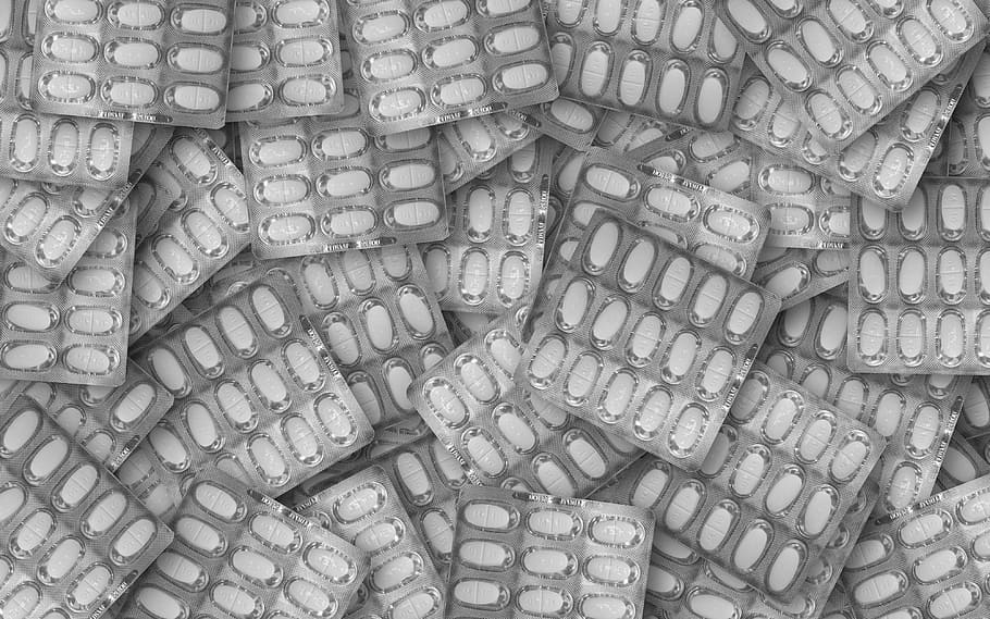 oval white medication pill blister pack lot, pills, drugs, medicine