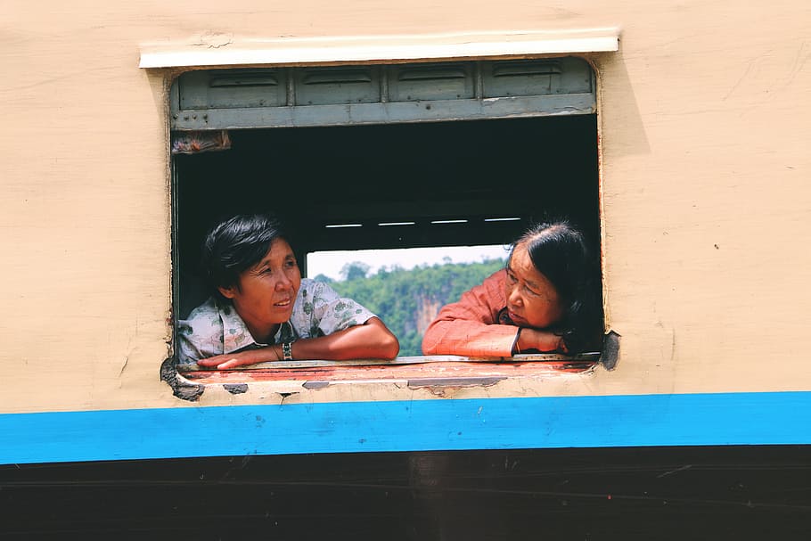 woman talking to another woman, two women leaning at window, person HD wallpaper