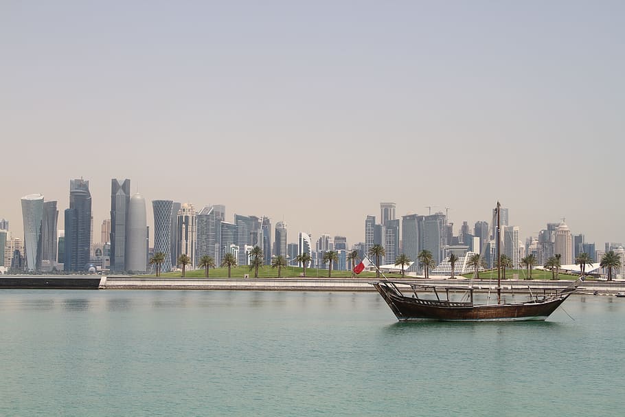 brown boat, water, city, river, skyline, cityscape, qatar, architecture HD wallpaper
