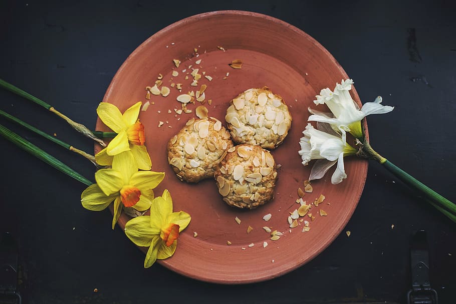 three brown foods on plate, dessert, almonds, flower, yellow HD wallpaper