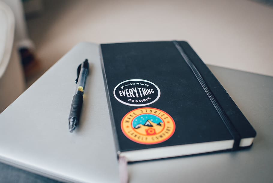 black Everthing book near click pen, notebook, writing, planning HD wallpaper