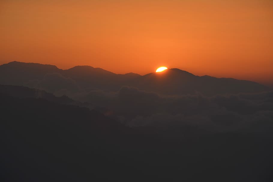 silhouette photo of mountain, photo of mountain covering sun HD wallpaper