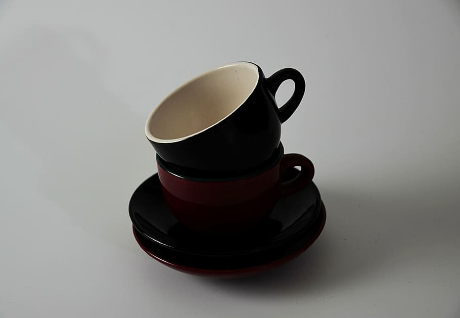 two black and brown ceramic cups, tea, saucer, red, white, kitchen HD wallpaper
