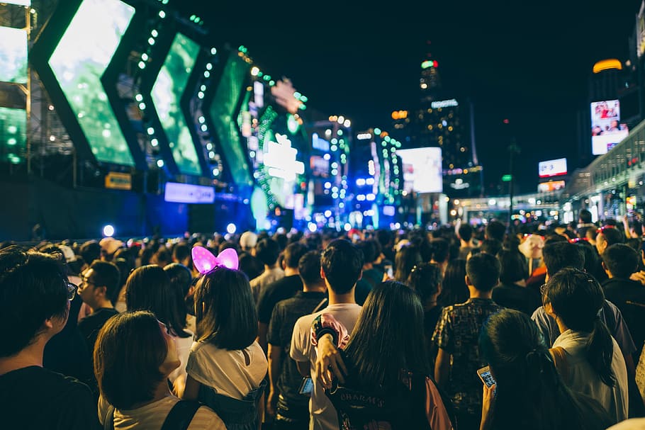 group of people in an area surrounded by buildings, crowd of people gathered near buildings HD wallpaper