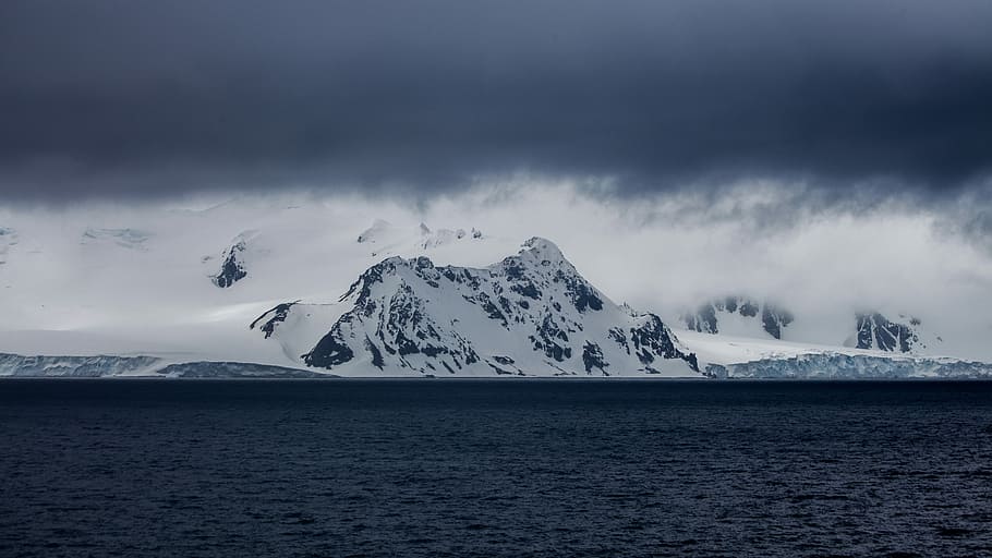 snow-covered mountain near body of water, glacier mountain near sea HD wallpaper