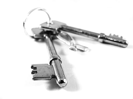 two silver skeleton keys in white surface, security, lock, unlock HD wallpaper