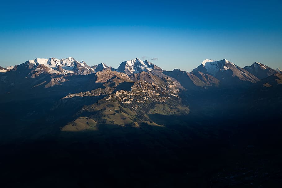photo of mountains and sky, gray and white snowy mountain under clear blue sky during daytime HD wallpaper