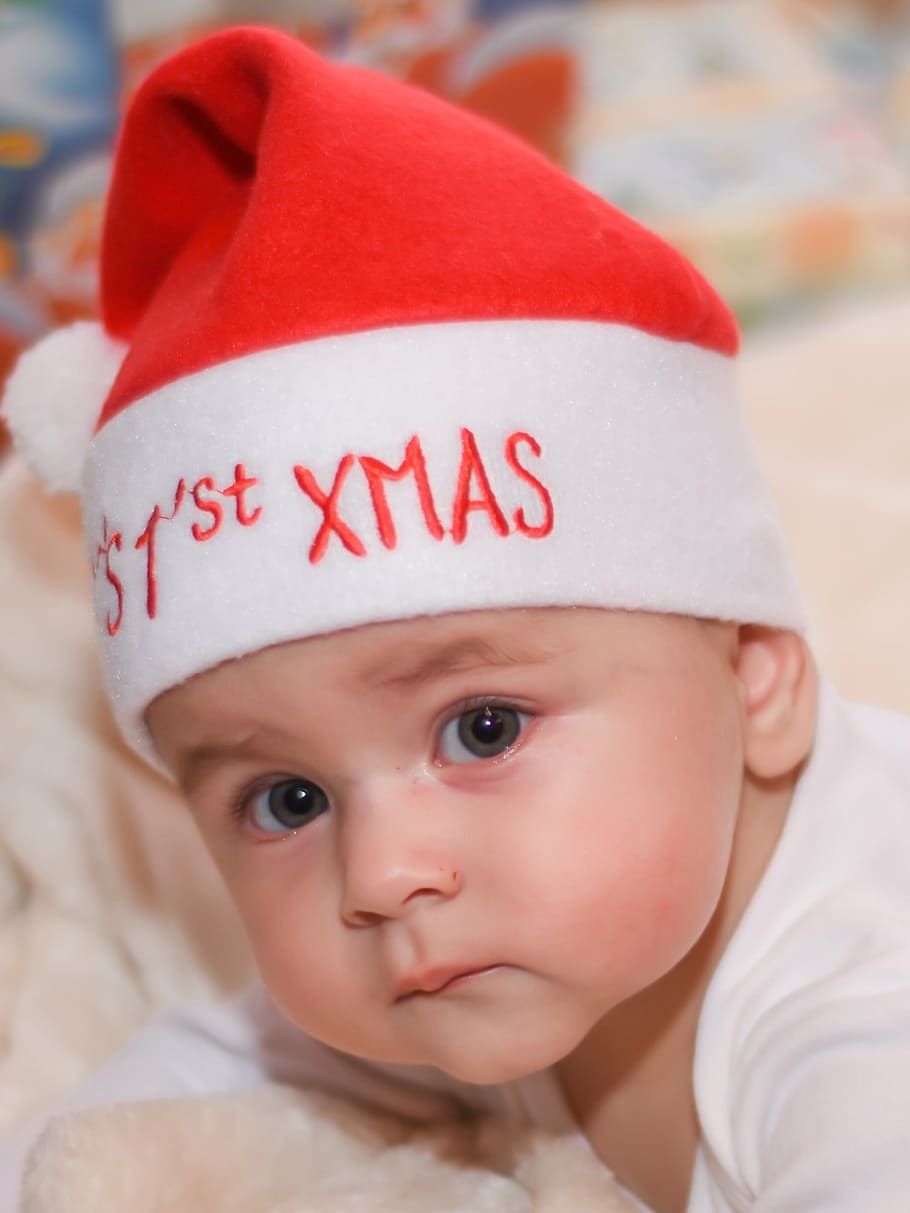 boy wearing a red and white Santa hat, baby, christmas, child