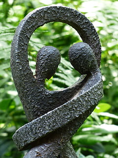 man and woman concrete figure, pair, lovers, togetherness, for two HD wallpaper