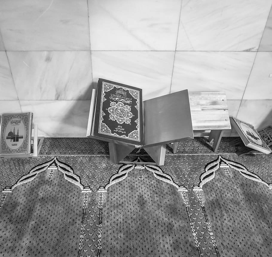 grayscale photo of books on racks, mosque, madrid, muslim, islam