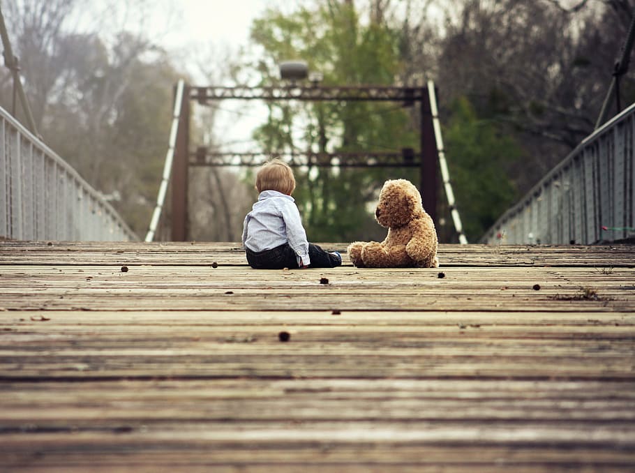 boy sitting beside brown bear plush toy, teddy, bridge, small HD wallpaper