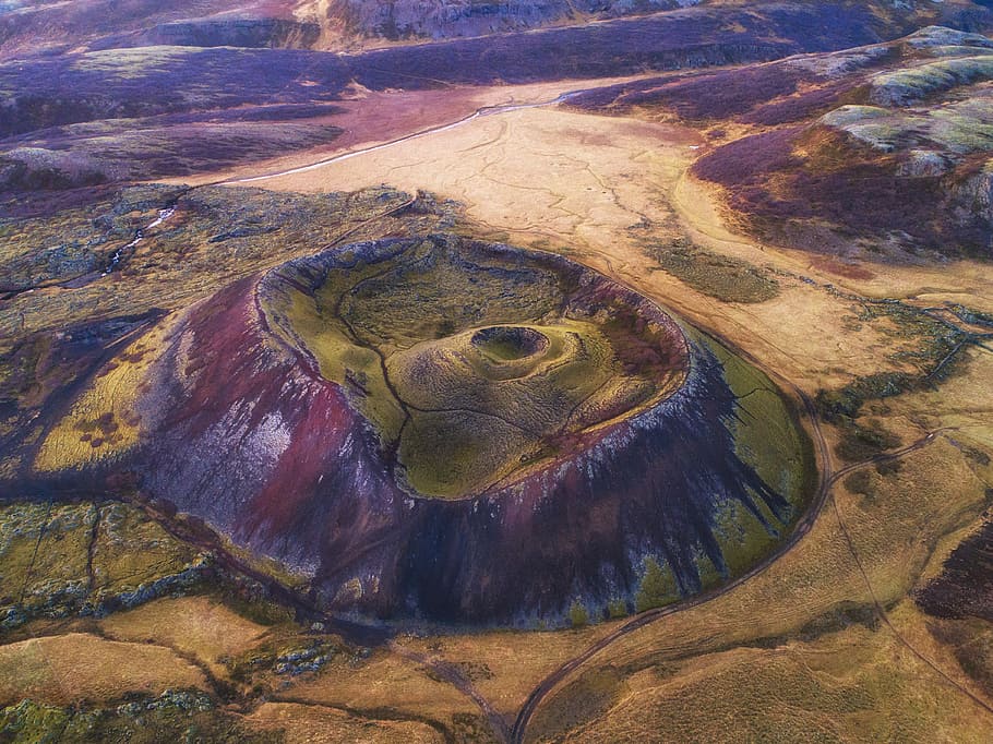 aerial view of a volcano during daytime, aerial photo of green and brown hill at daytime HD wallpaper