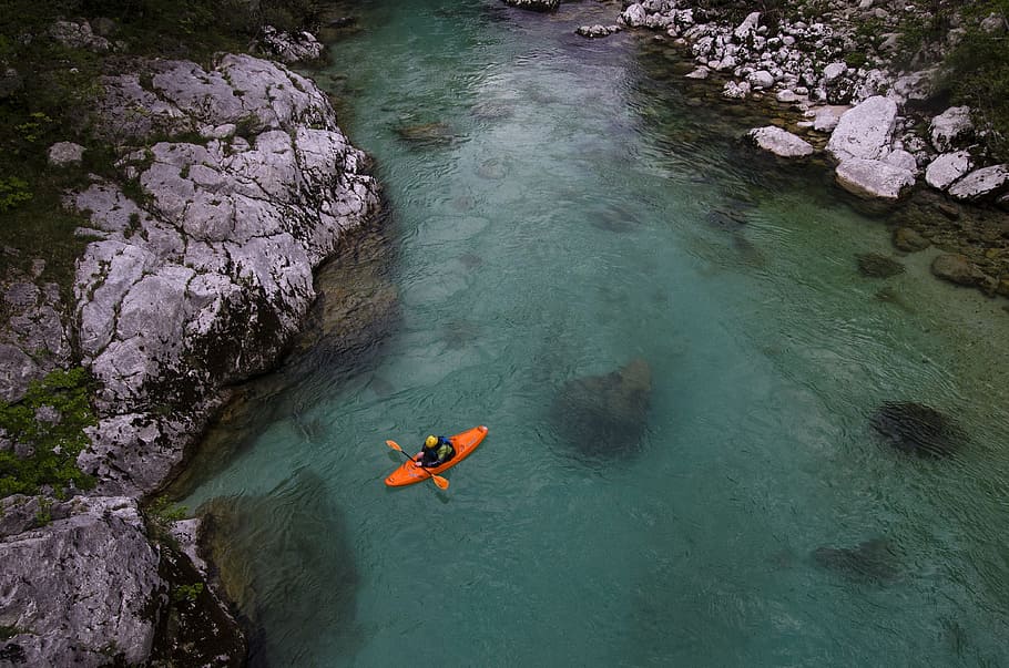 person on riding orange kayak on river, person kayaking on body of water HD wallpaper