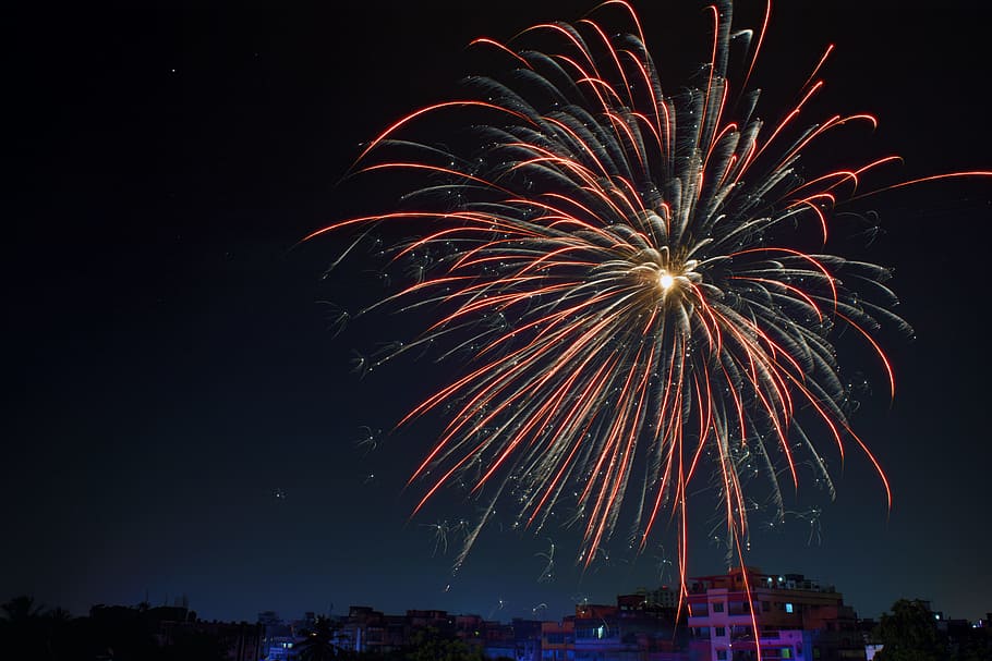 Fireworks Display over Building, blast, bright, celebration, colors HD wallpaper