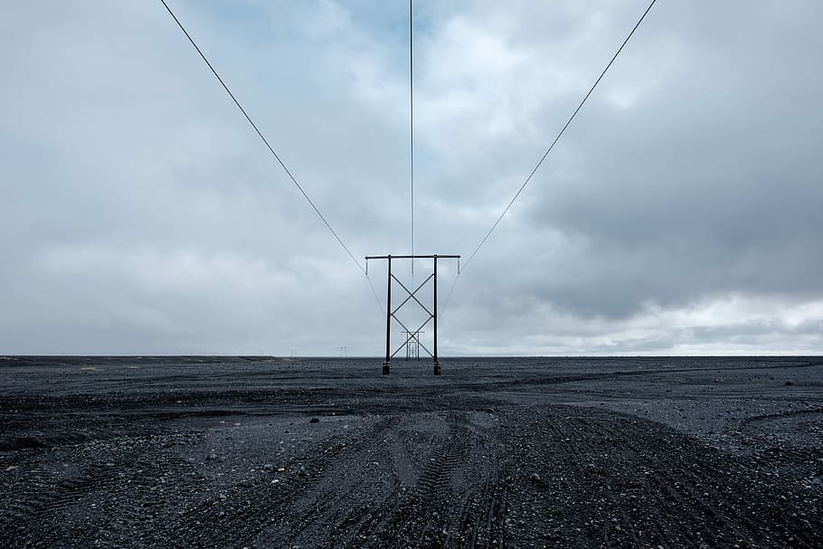 black post under gray clouds, power line, sky, horizon, black sand HD wallpaper