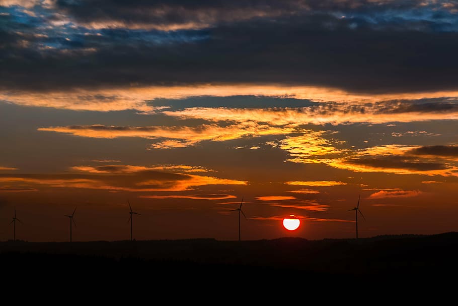 silhouette of windmills on sunset, windräder, clouds, forest HD wallpaper