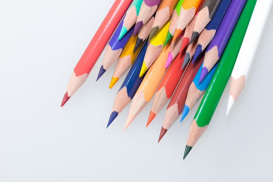 color pencil lot, colored pencils, wooden pegs, pens, colorful